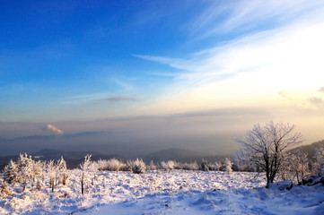 Winter landscape and sunset