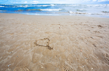 Symbol of love on the beach