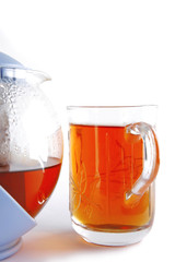 tea in glass and kettle