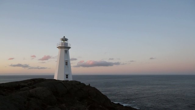 Atlantic Canada lighthouse at sunset.