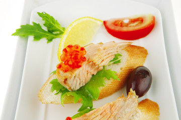 red salmon on baguette