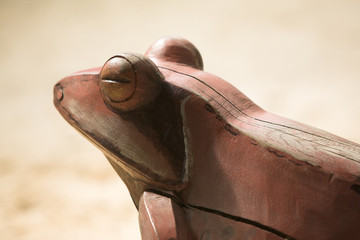 wooden frog sculpture