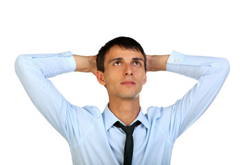 Portrait of a happy young man looking upwards in thought