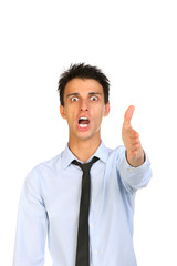 portrait of a young man screaming out loud and anger