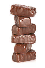 Chocolate candies over white background