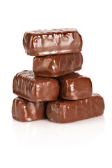 Chocolate candies over white background