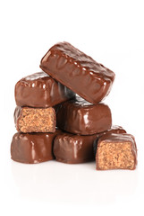 Chocolate candies over white background