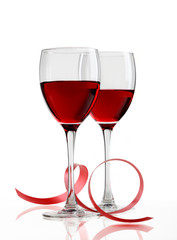 Glass of red wine on a white background and with soft shadow