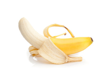 Peeled banana on white background © Ioannis Pantzi