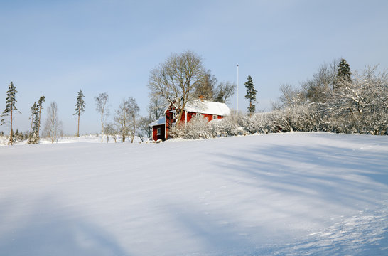 small farm in wintery sweden