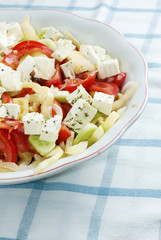 Salad with feta cheese, tomato and corn
