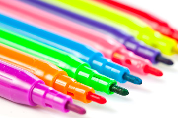 Felt pens on white background