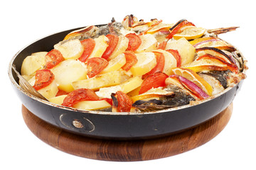 Haarder stuffed baked with potatoes and tomatoes