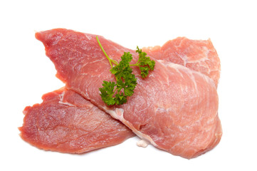 Several pieces of meat with parsley isolated on white