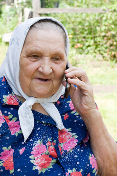 grandmother talking with a phone