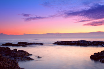 colorful sunrise on the rocky coast