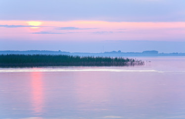 Lake sunset hazy view