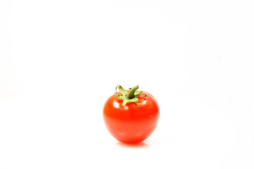 Small tomatoes isolated on white background