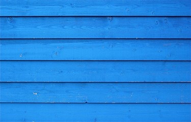Obraz premium Mur en bois coloré en bleu