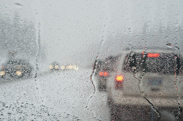 Winter traffic jam seen through a windshield