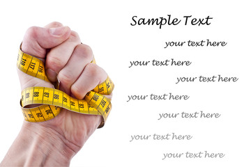 Hand with measuring tape - Concept
