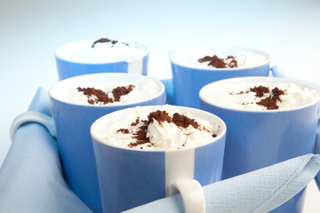 Blue cups with serviettes