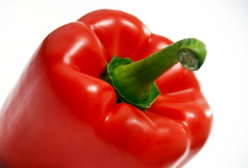 red raw pepper on white