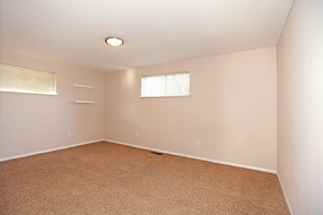 Empty bedroom with small windows