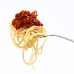 Spaghetti with sauce bolognese hanging on a fork