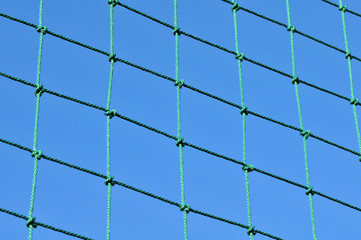 Net with blue sky on background