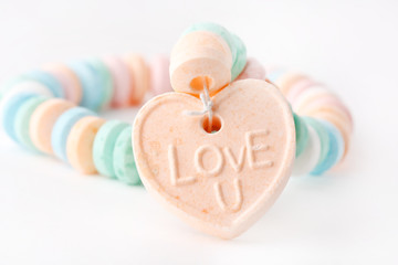 Candy necklace with Love U on it