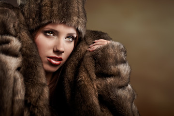 beautiful woman in a fur coat