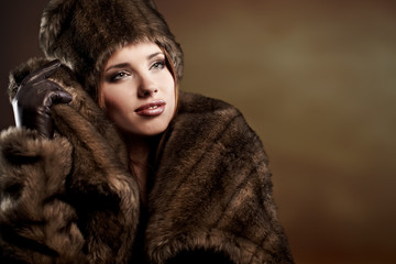 beautiful woman in a fur coat