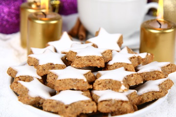 Christmas star shaped cookies and a cup of hot cocoa