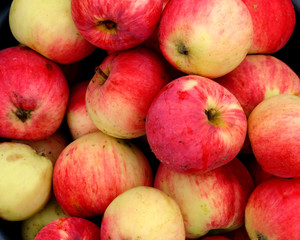 Red apples in the buckets