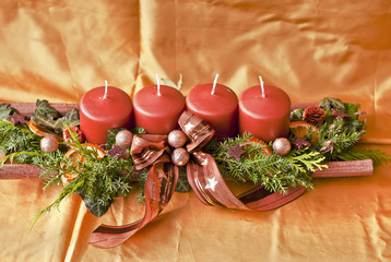 Red candles on brown background