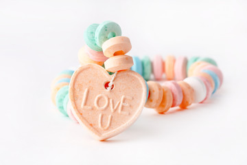 Candy necklace with Love U on it