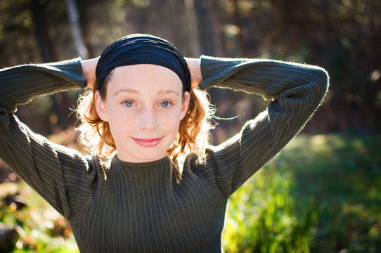 beautiful tween aged girl in evening light