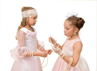 Fashion girl trying on pearl necklace