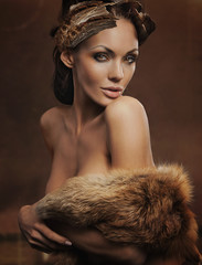 portrait of a beautiful woman wearing fur