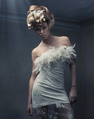 Fine art photo of a stylish blond beauty © konradbak
