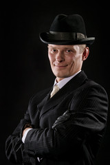 Man in suit and hat