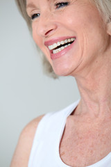 Closeup of senior woman with beautiful smile