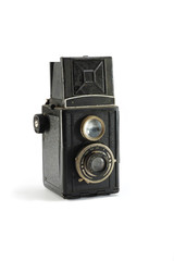 Old film photo camera on white background