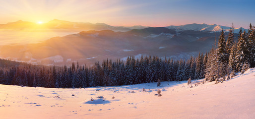 colorful winter sunrise in the mountains