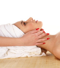 A young and beautiful woman in a spa treatment procedure