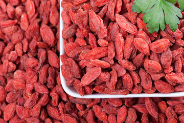 red dried goji berries background