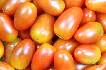 A background of fresh  tomatoes