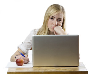 Naklejka premium Teenage girl with laptop computer