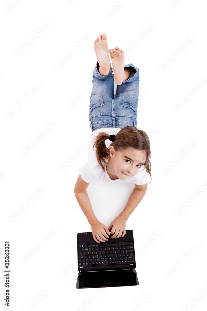 Wall mural little student girl with a laptop